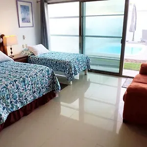 Casa Abril Cozzy Suites Cancún